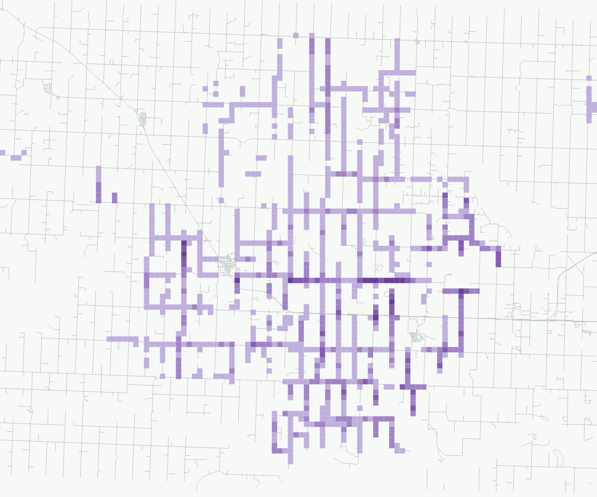 Applied-liquid map: lavender to deep purple cells show increasing estimated litres, with grey reference roads.